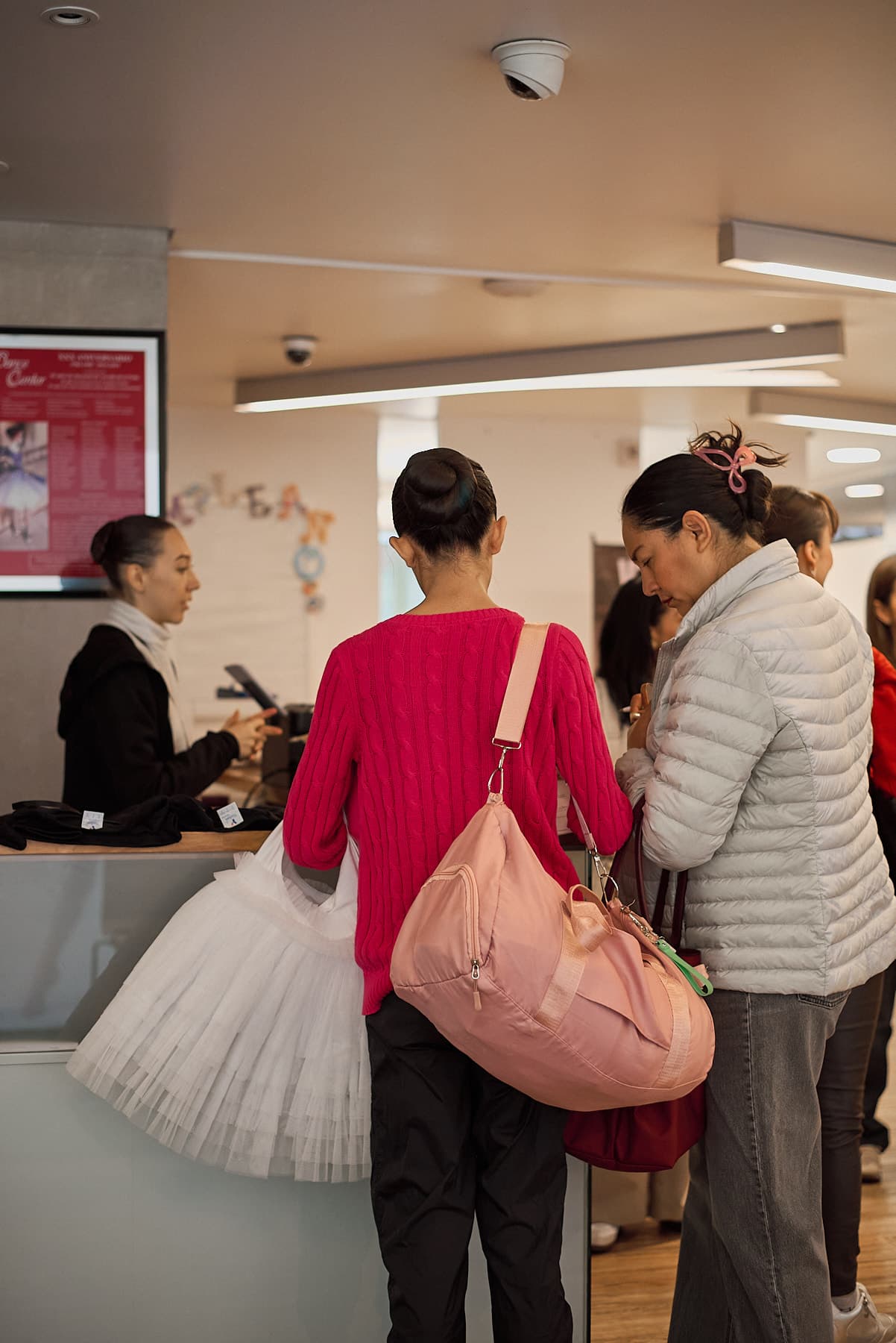 Student with a tutu at check-in